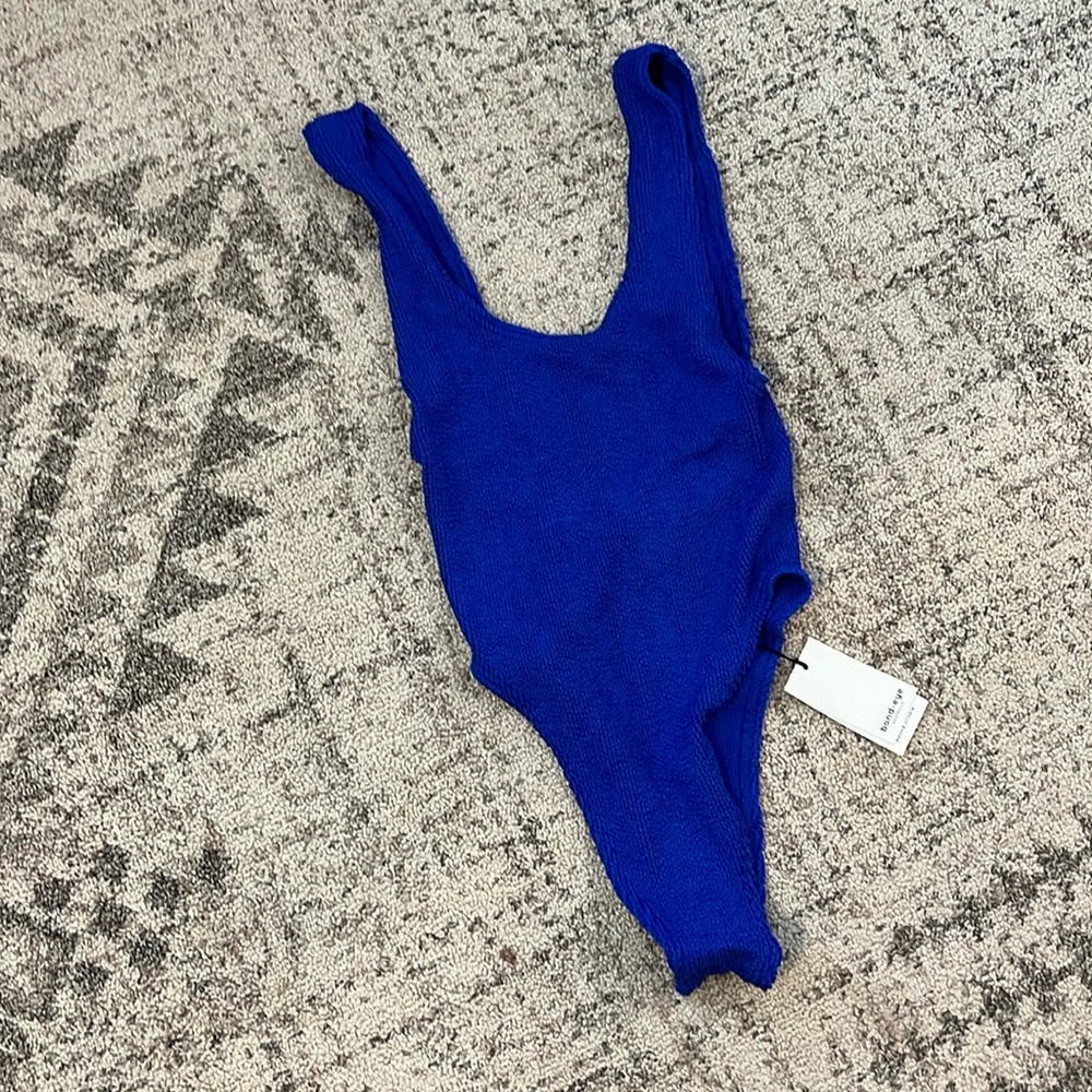 Bond-eye bound Linda one piece in lapis shimmer